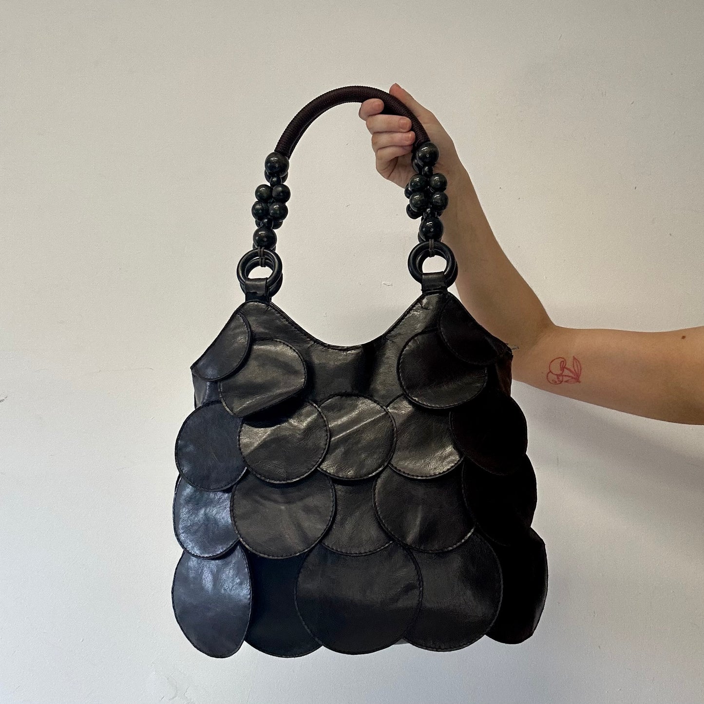 dark brown faux leather disc beaded shoulder bag