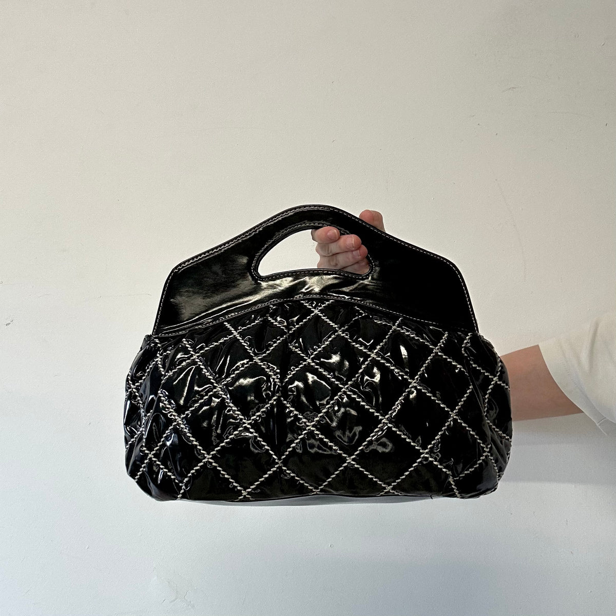 black and white contrast stitching padded handbag