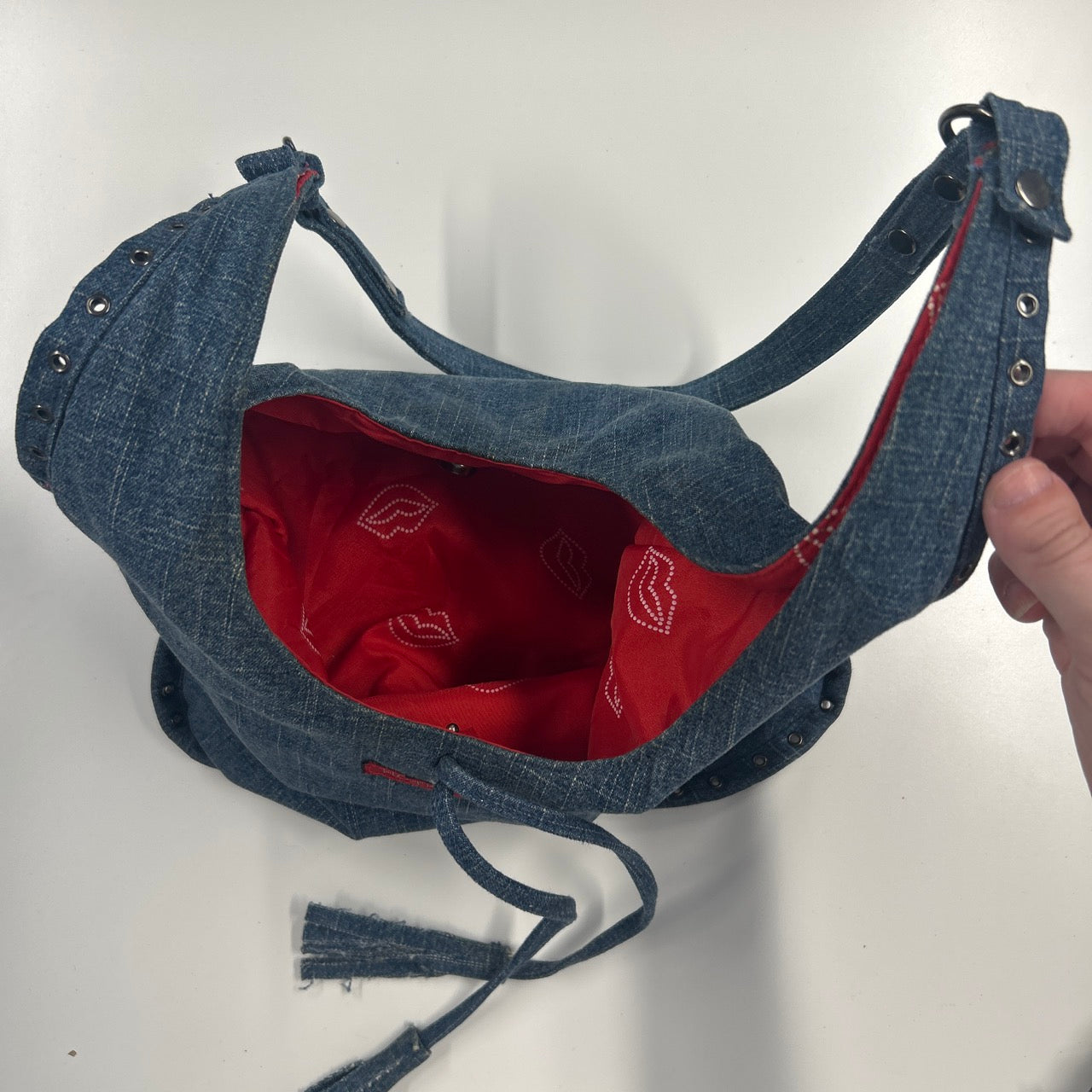 blue denim eyelet shoulder bag