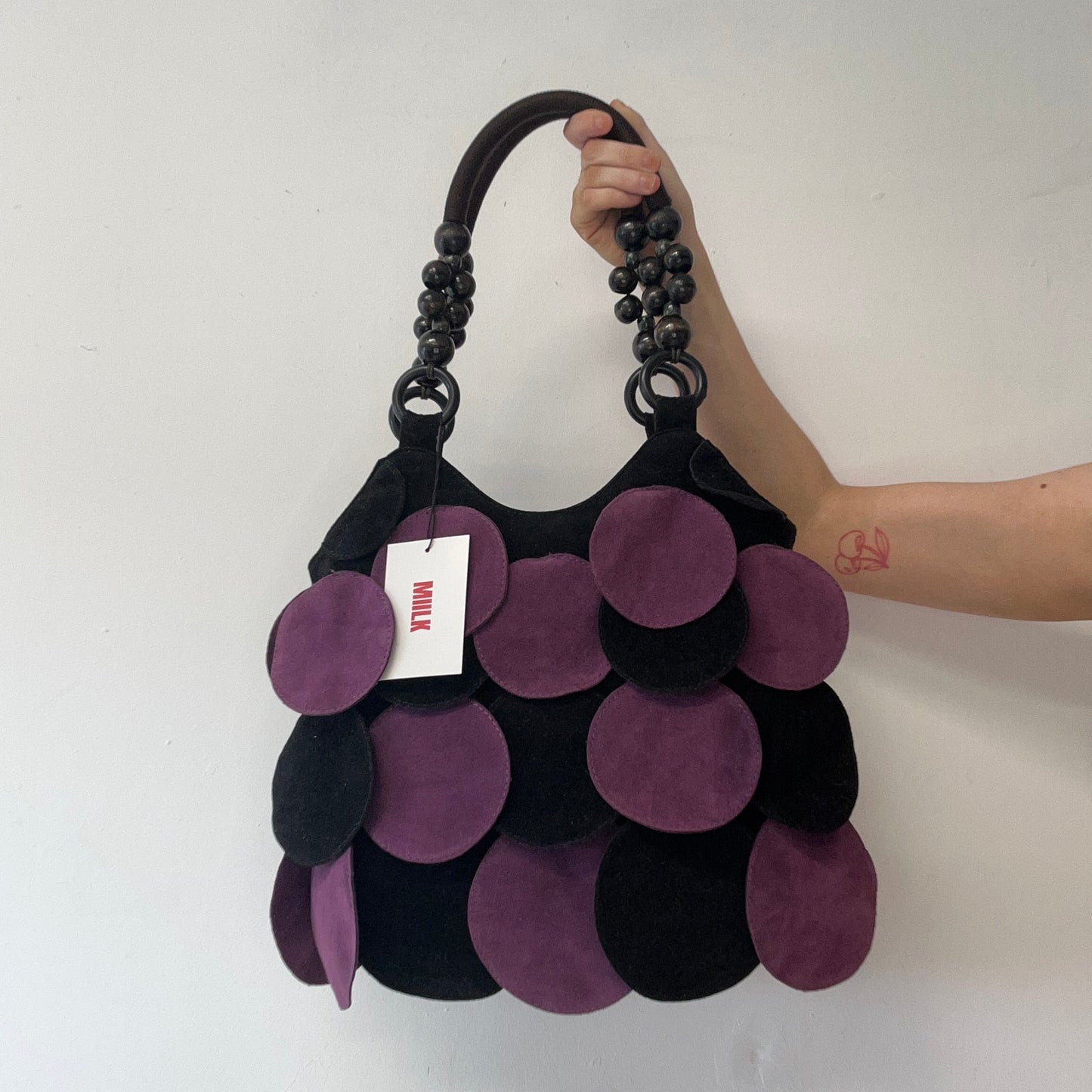 purple and black suede feel disc beaded shoulder bag