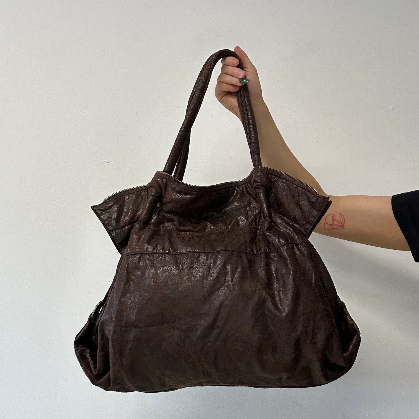 brown studded faux leather slouchy  shoulder bag