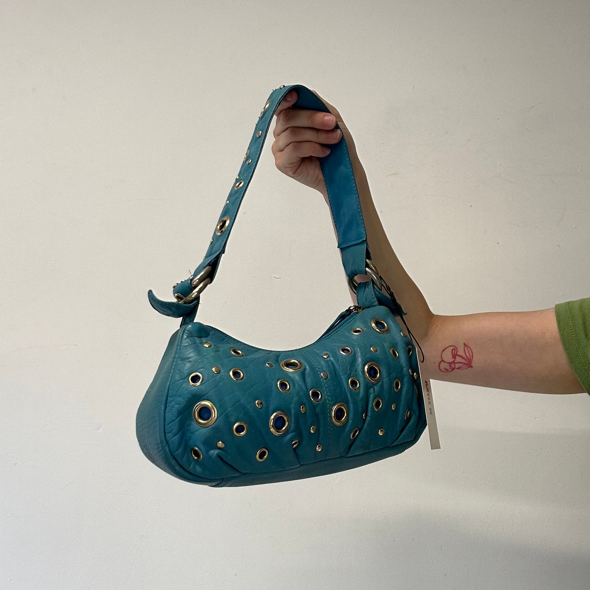 blue genuine leather eyelet shoulder bag