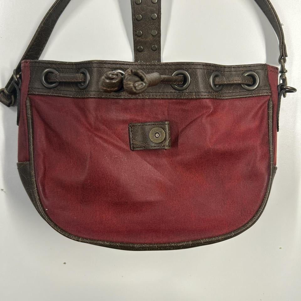 red and brown studded  faux leather shoulder bag