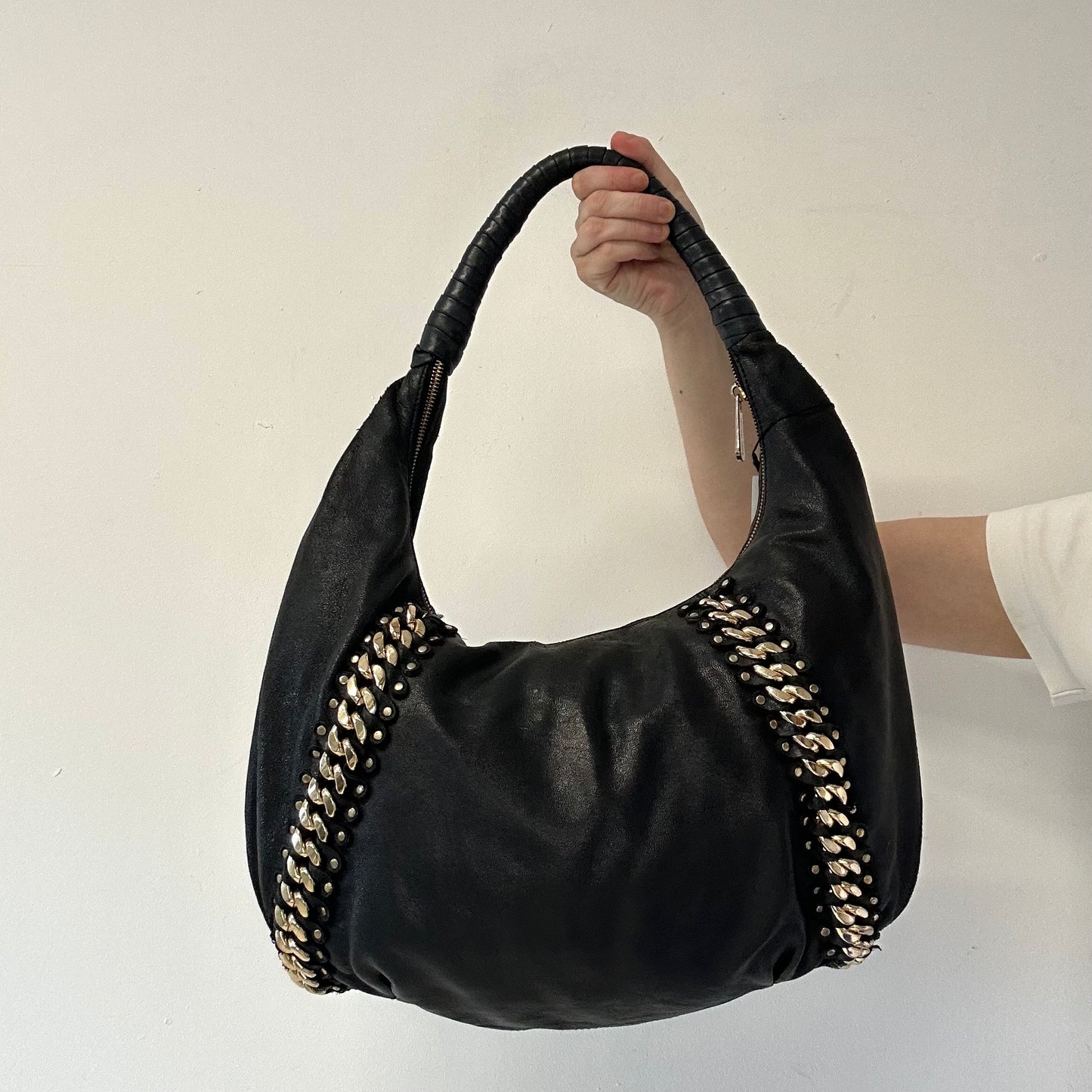 black genuine leather studded half crescent shoulder bag