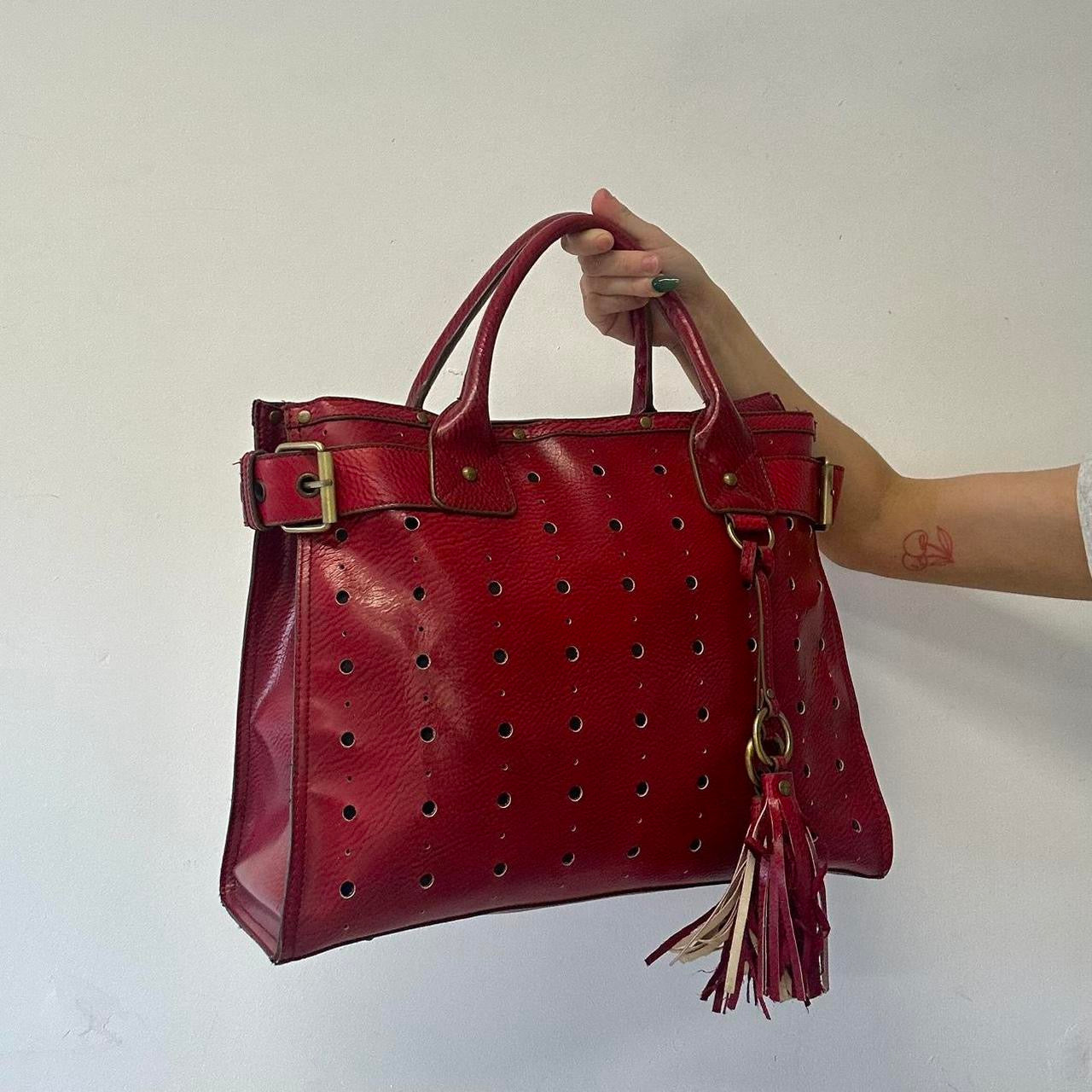 red faux leather studded buckle shoulder bag