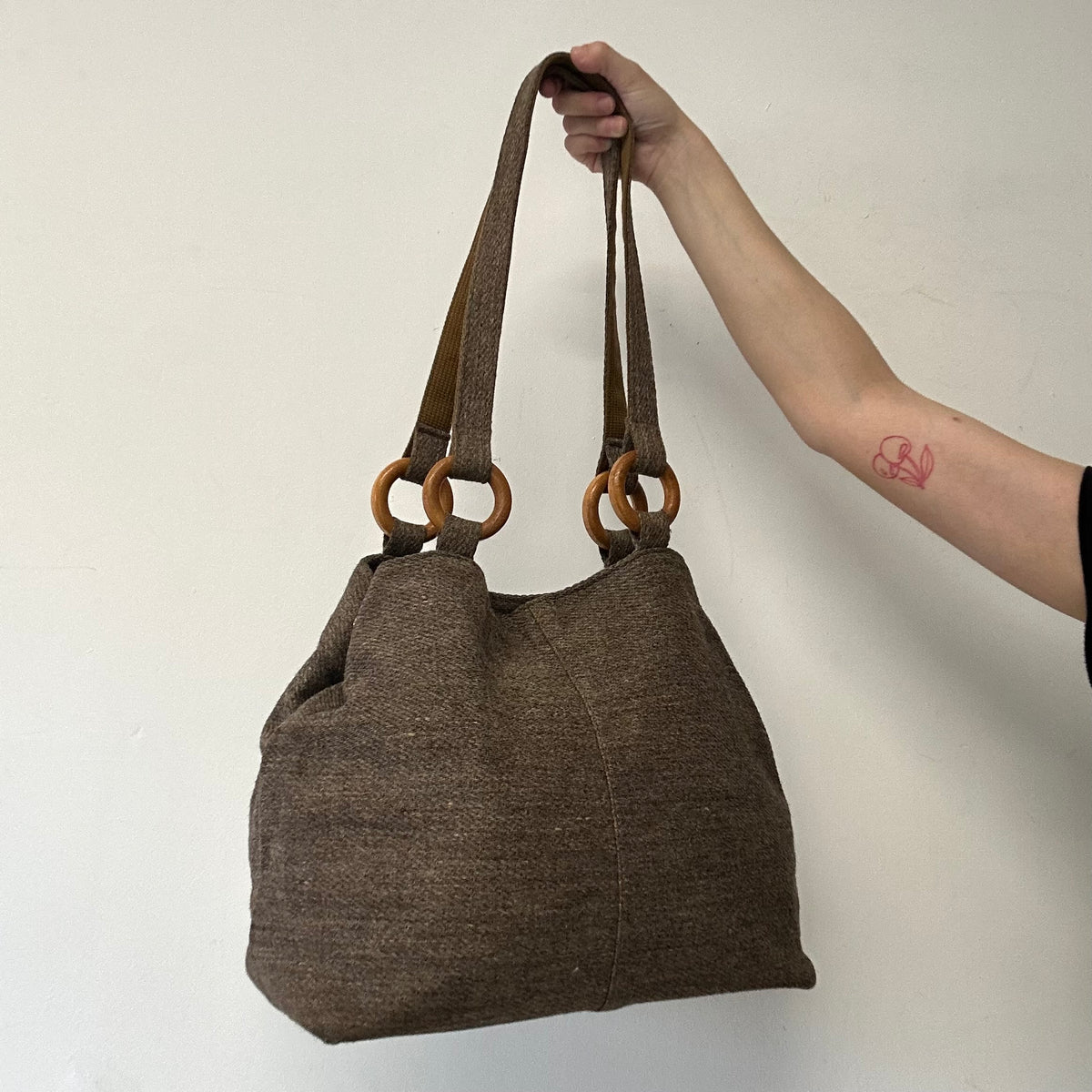 brown woven shoulder bag