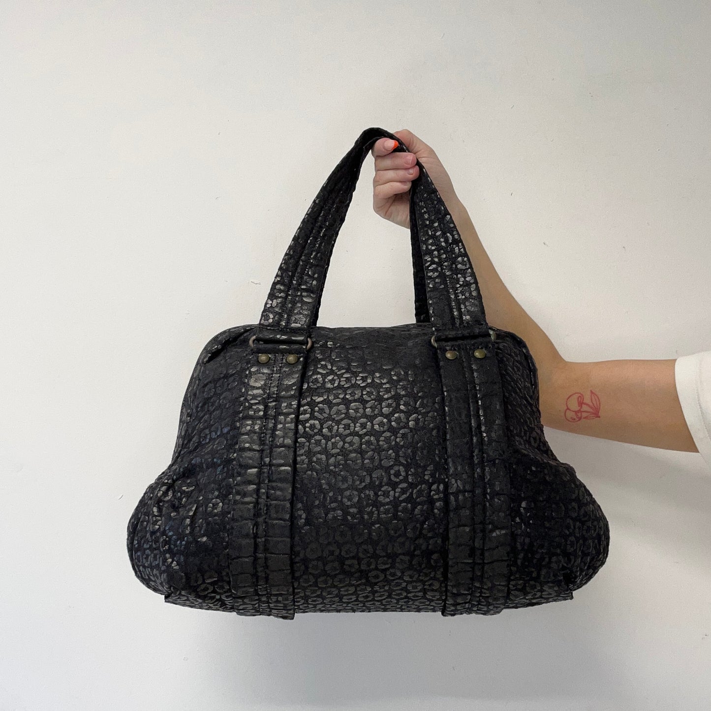 black leopard patterned shoulder bag