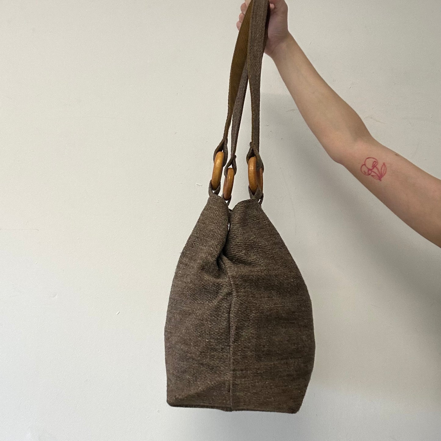 brown woven shoulder bag