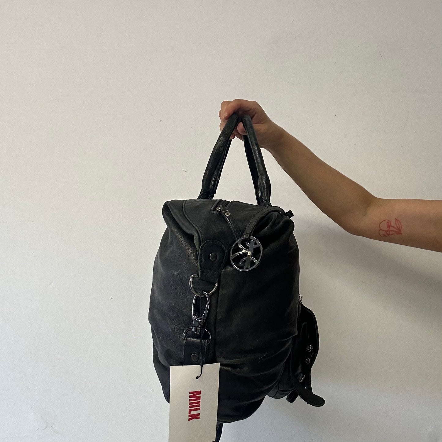 black genuine leather buckle luggage bag