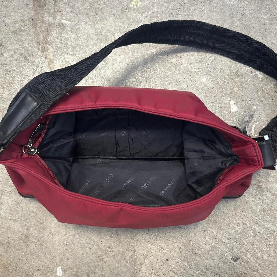 red and black canvas shoulder bag