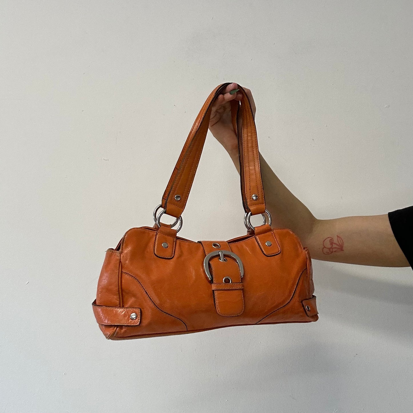 orange faux leather buckle shoulder bag