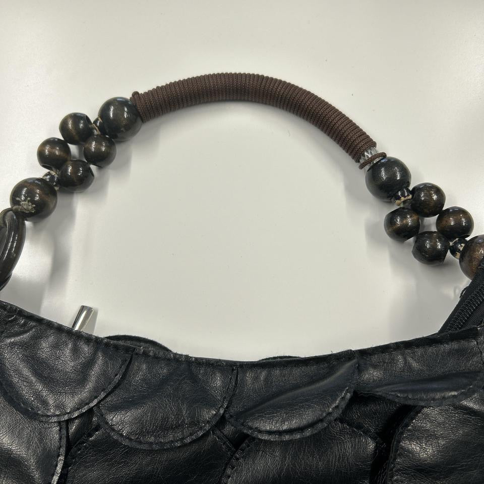 black faux leather disc beaded shoulder bag