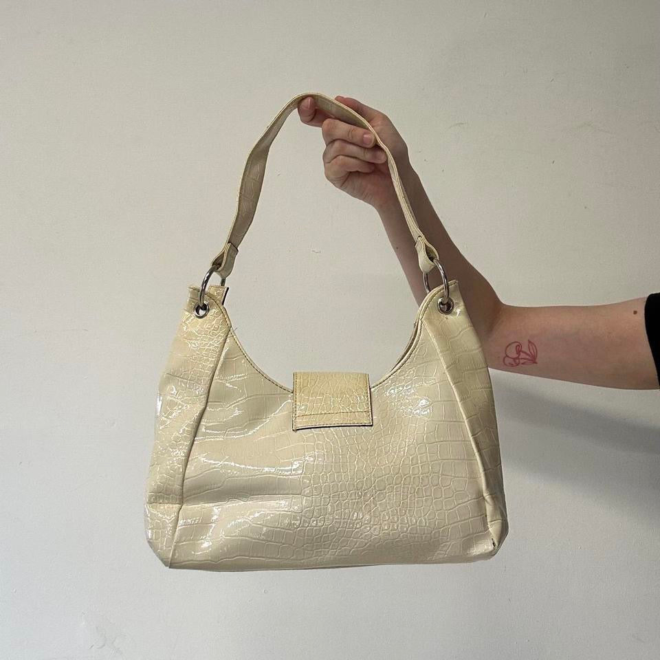 cream faux leather buckle effect shoulder bag