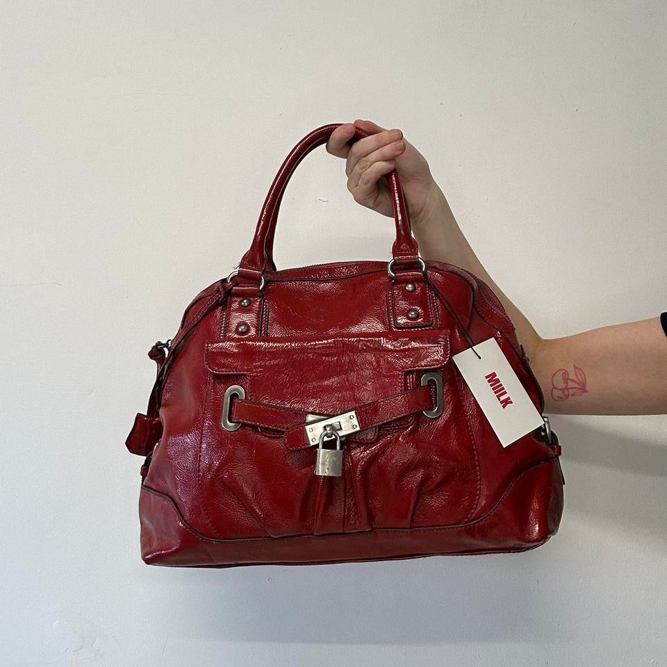 red faux leather padlock buckle shoulder bag