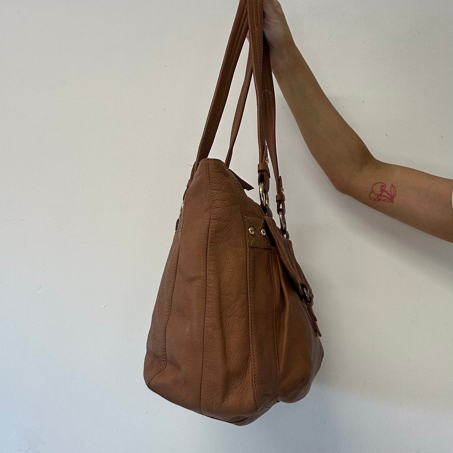 brown buckle leather shoulder bag