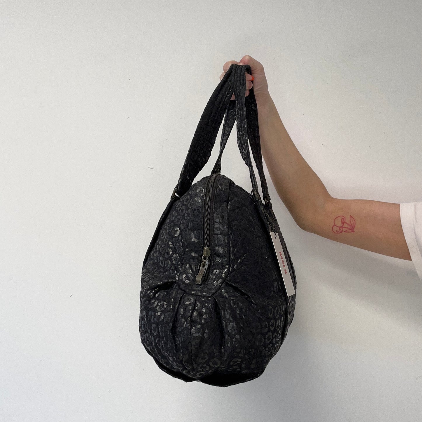 black leopard patterned shoulder bag