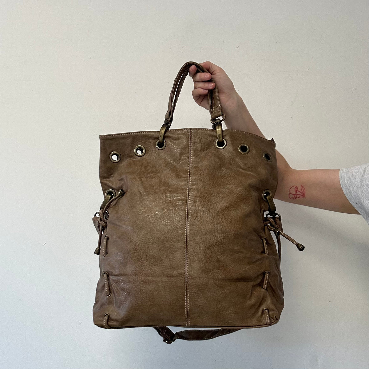 brown eyelet ruched sides faux leather shoulder bag