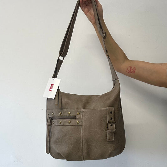 light brown buckle and studded cross body / shoulder bag