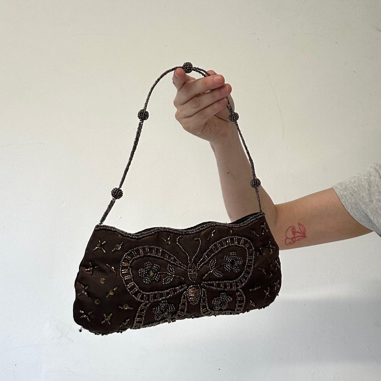 brown sequin butterfly wire handle shoulder bag