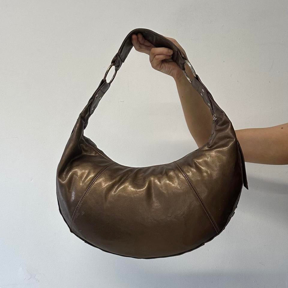 brown studded crescent faux leather shoulder bag