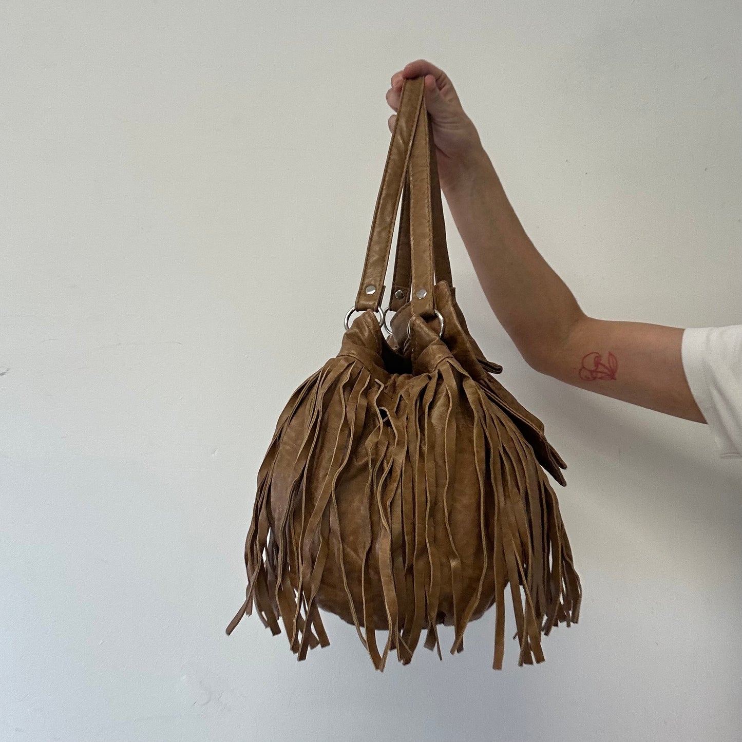 brown fringe oversized bow faux leather shoulder bag