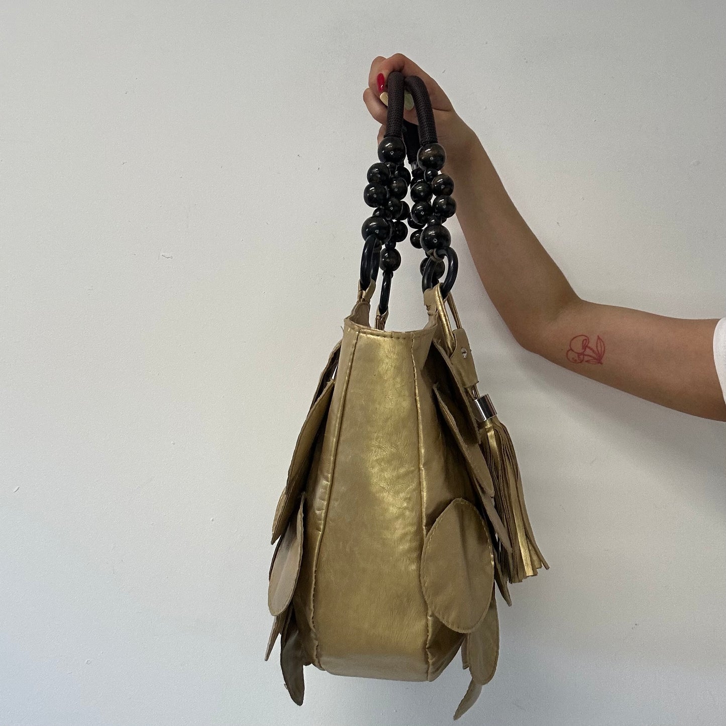 gold faux leather disc beaded shoulder bag
