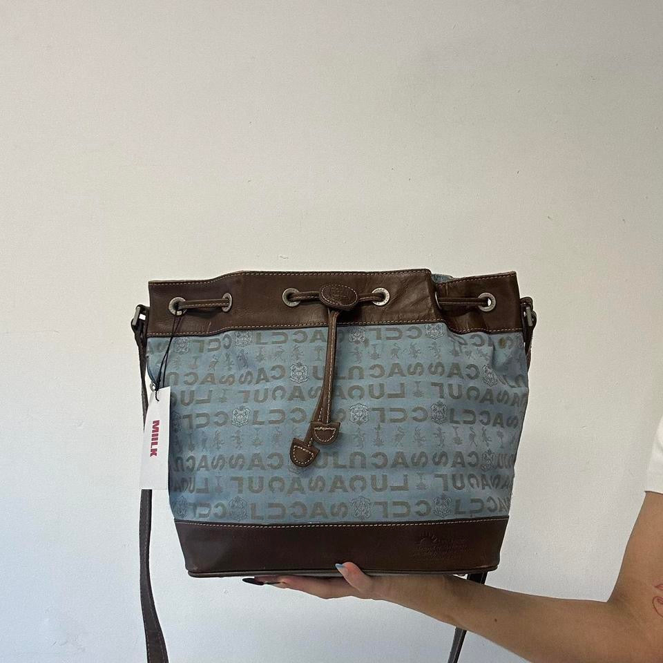 blue and brown crossbody drawstring bag