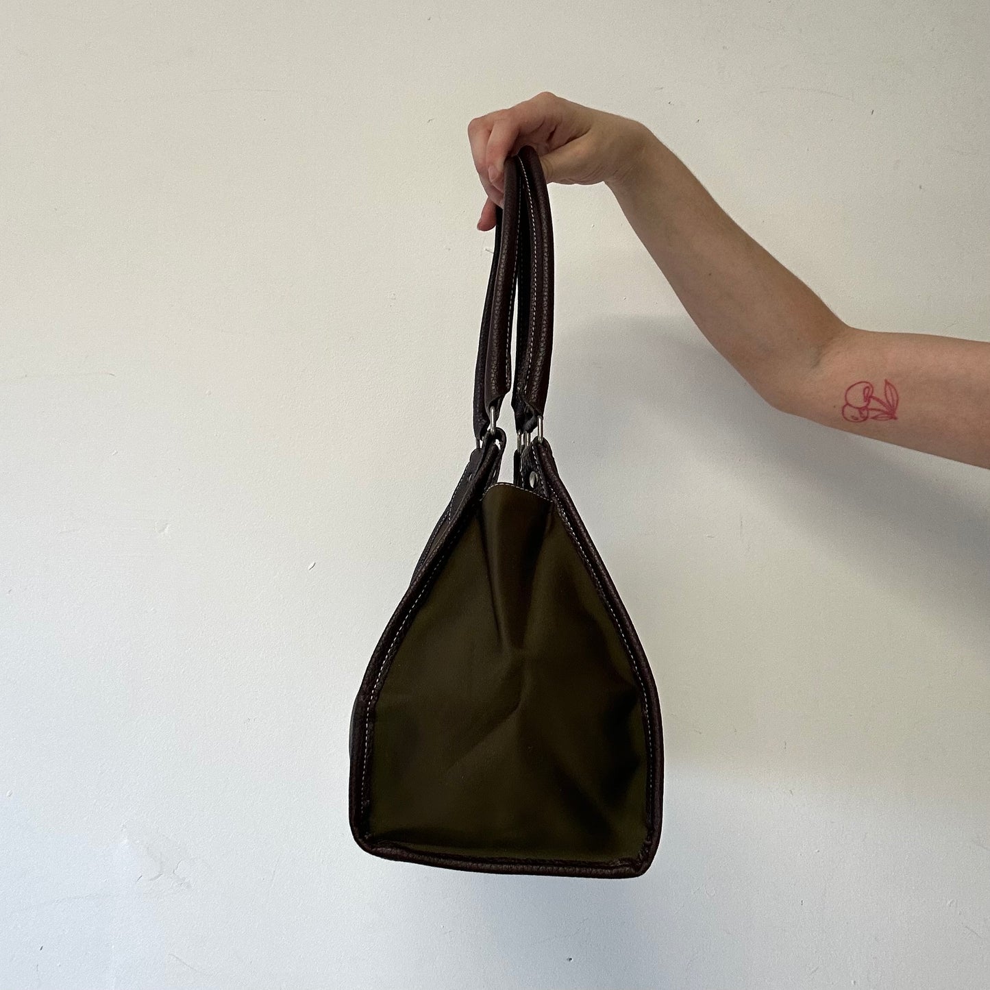 khaki canvas and brown faux leather buckle shoulder bag