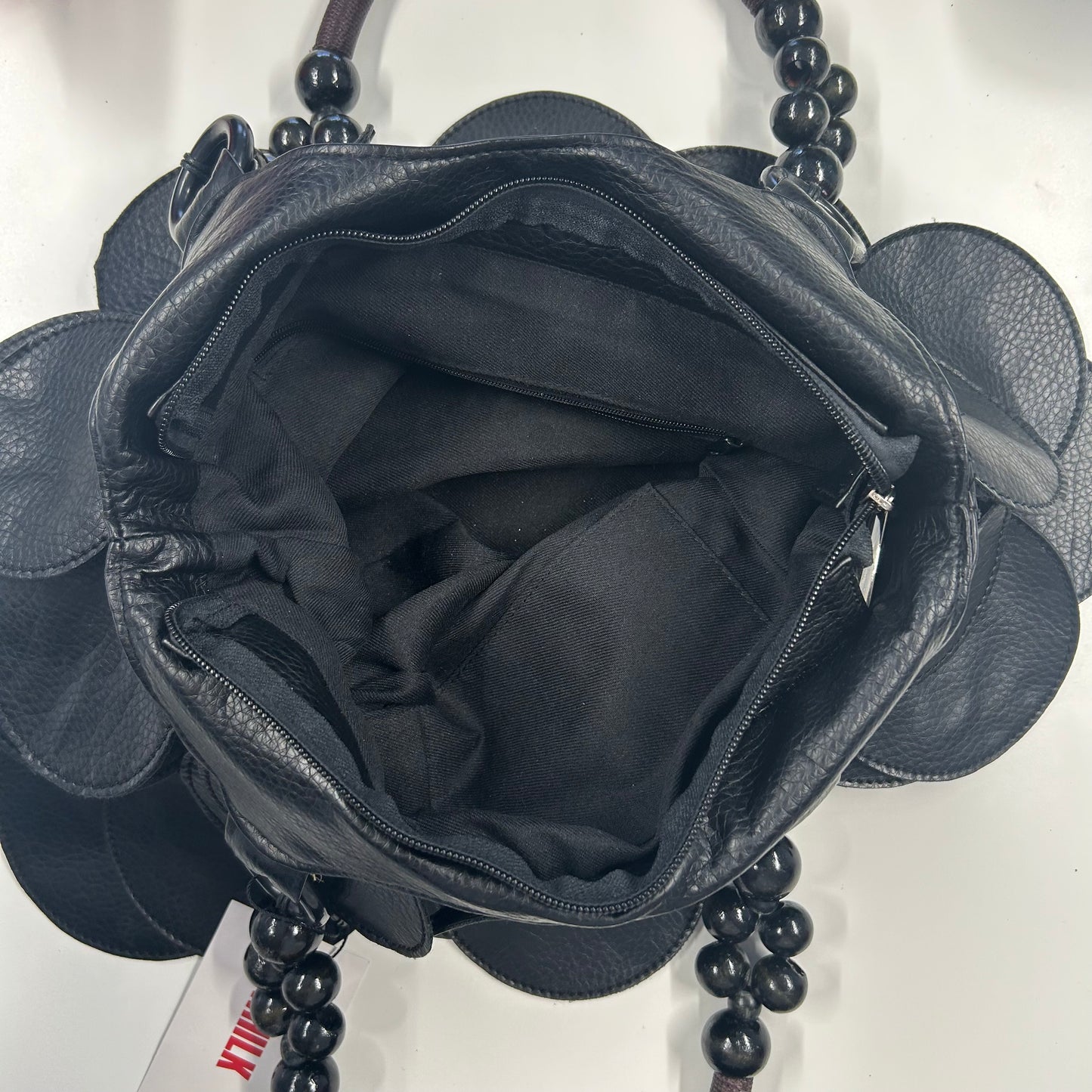 black faux leather disc beaded shoulder bag