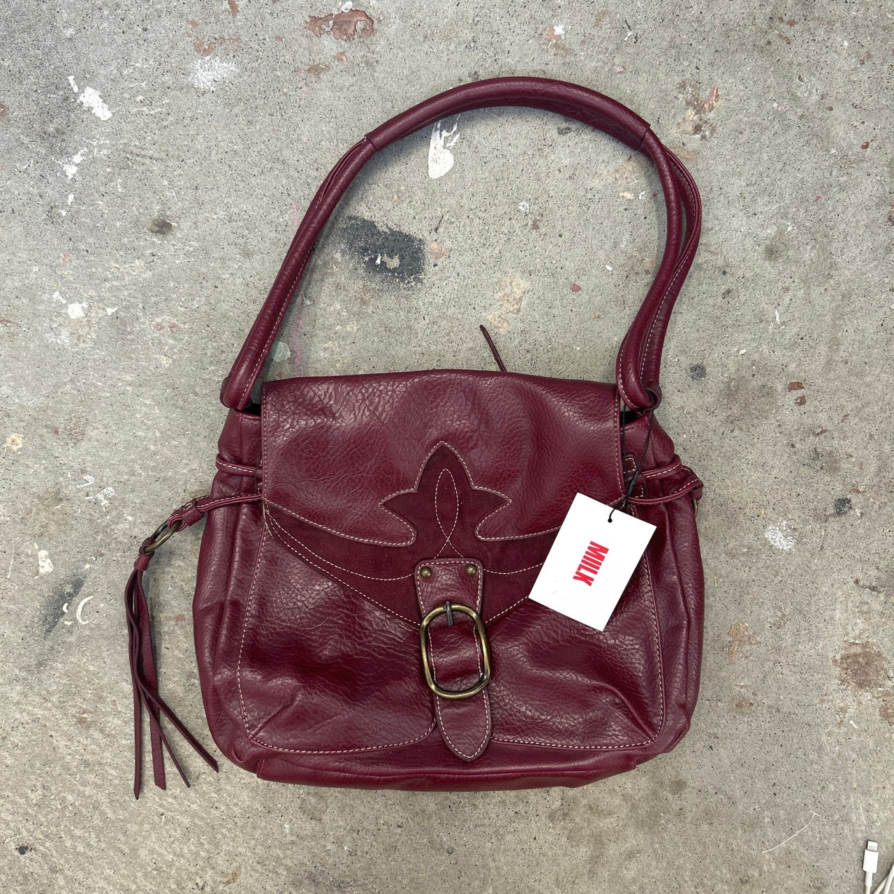 dark red faux leather western buckle shoulder bag