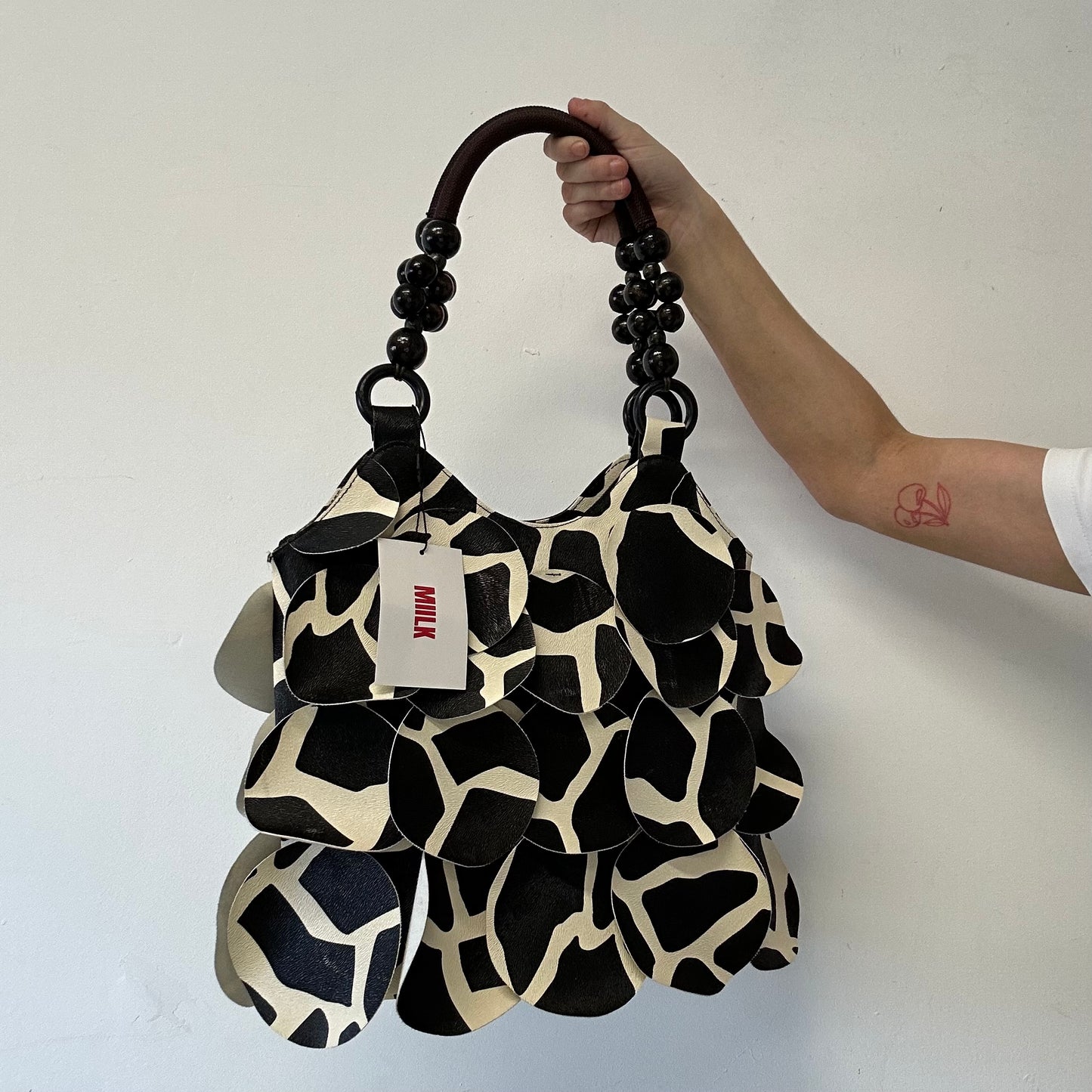 giraffe print faux leather disc beaded shoulder bag