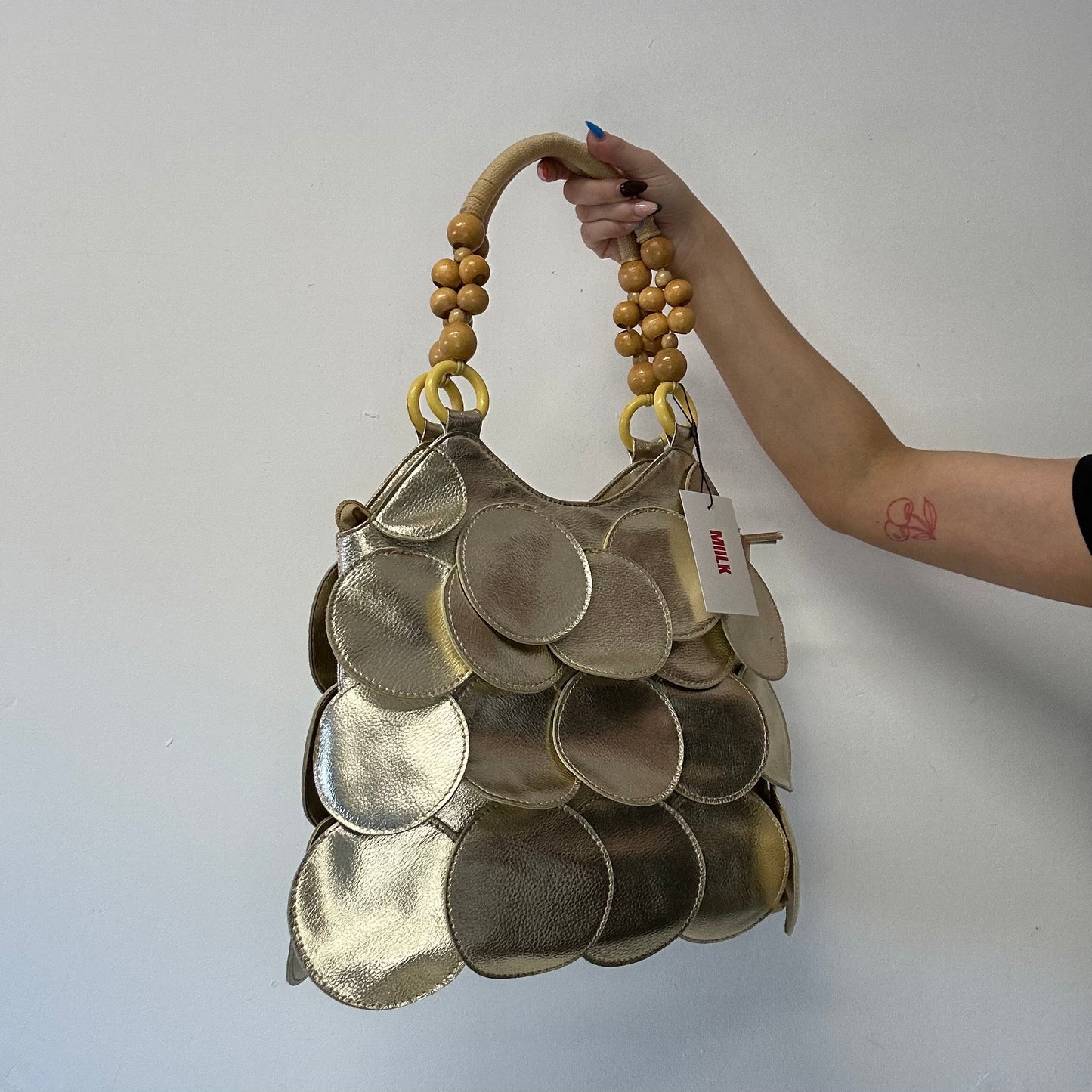 gold faux disc beaded shoulder bag