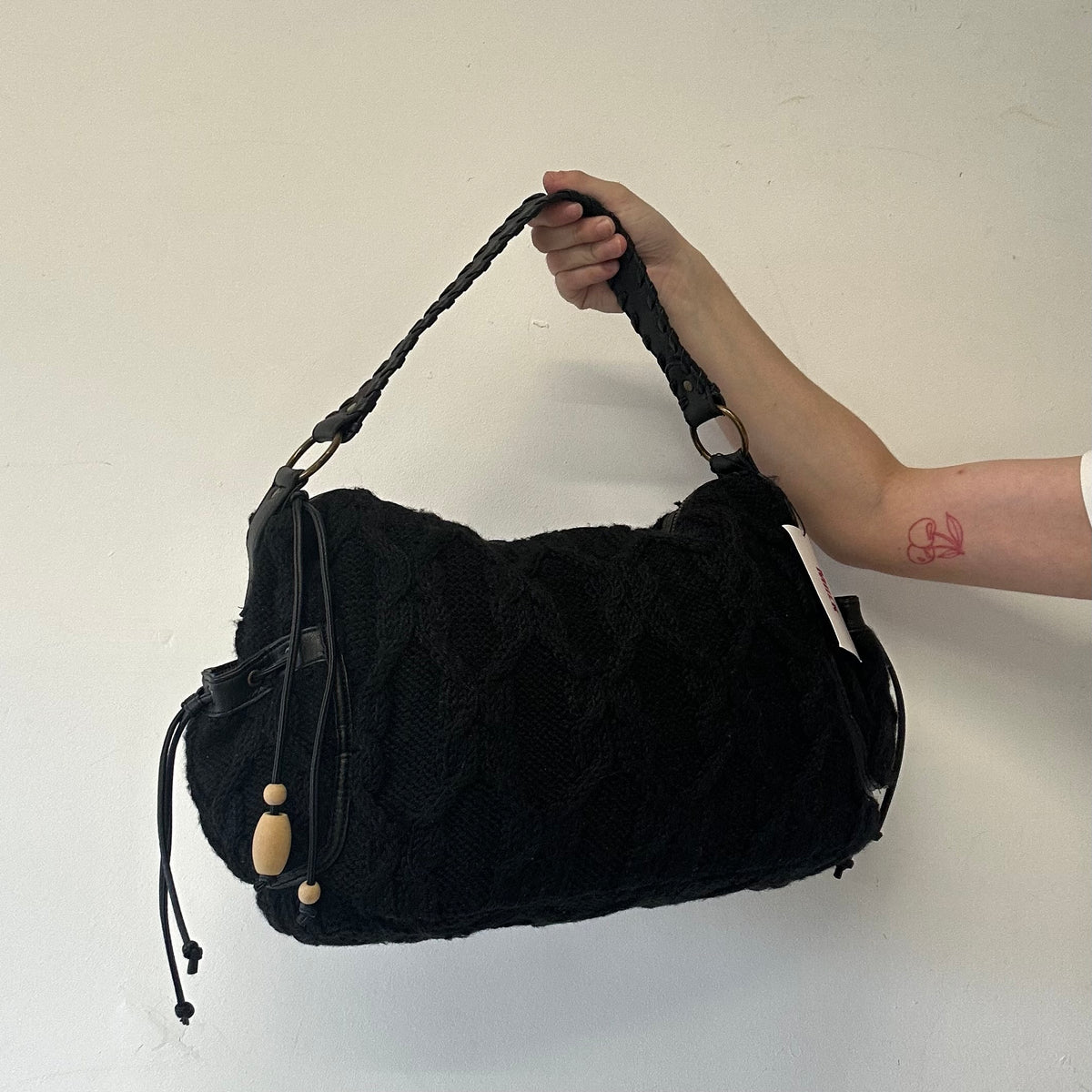 black knitted slouchy shoulder bag