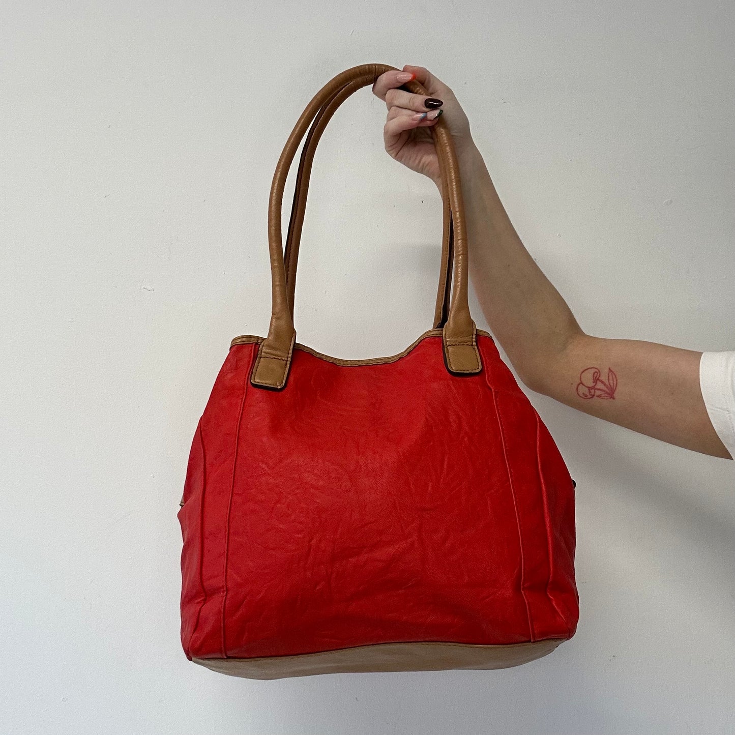 red and tanned faux leather shoulder bag