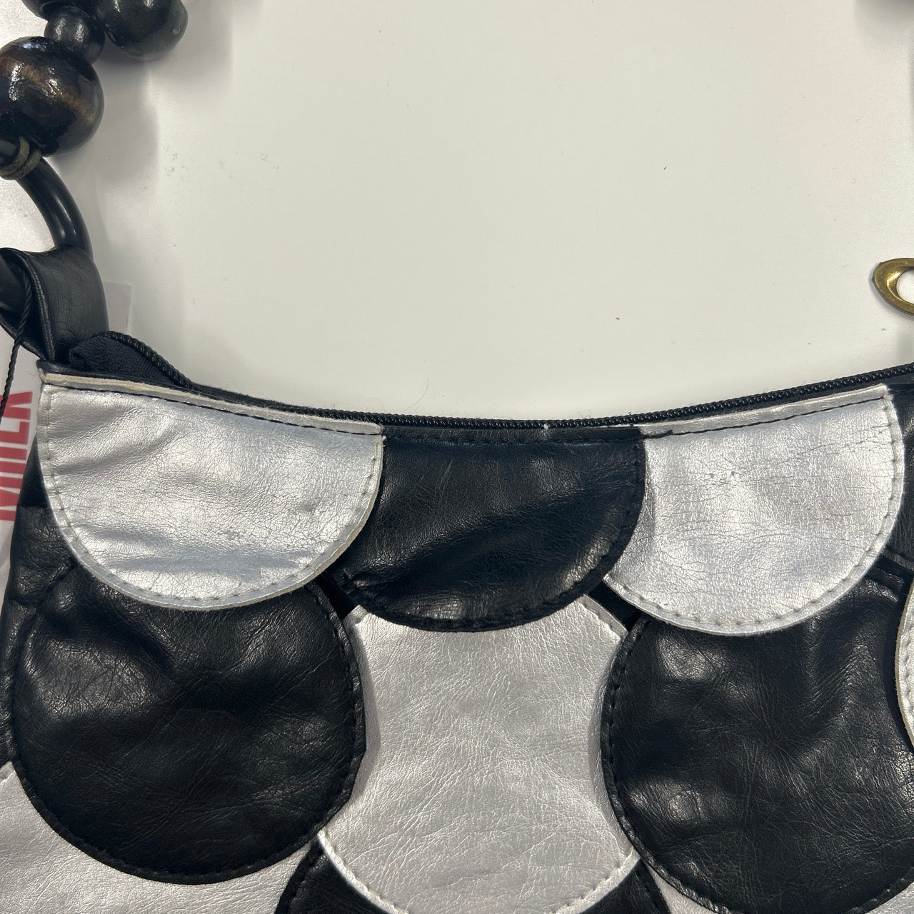 black and silver faux leather disc beaded shoulder bag very