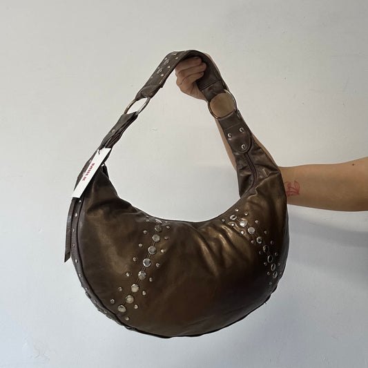 brown studded crescent faux leather shoulder bag