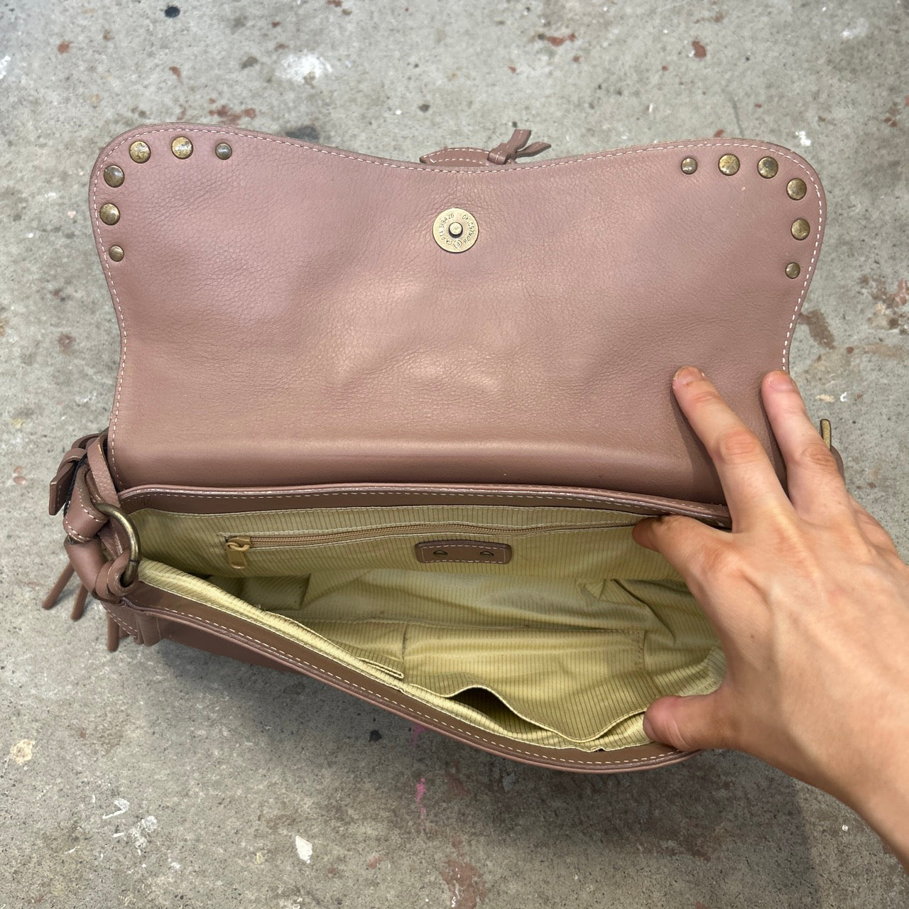 brown studded buckle shoulder bag
