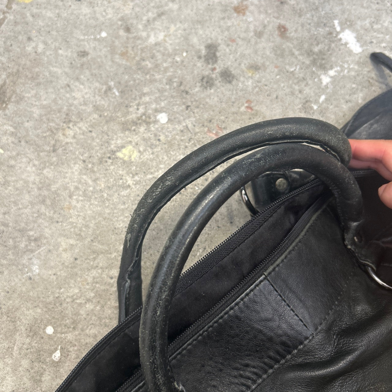 black genuine leather buckle luggage bag