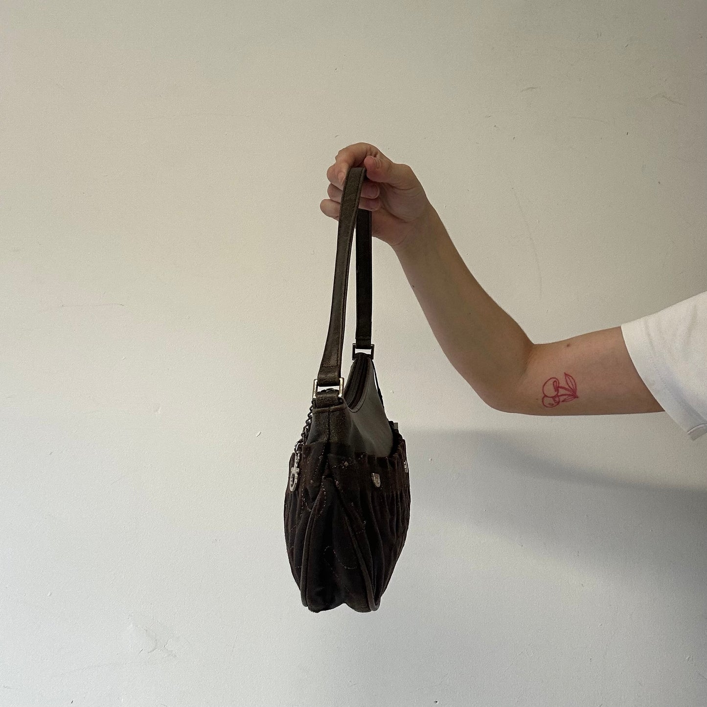 brown patterned faux leather shoulder bag