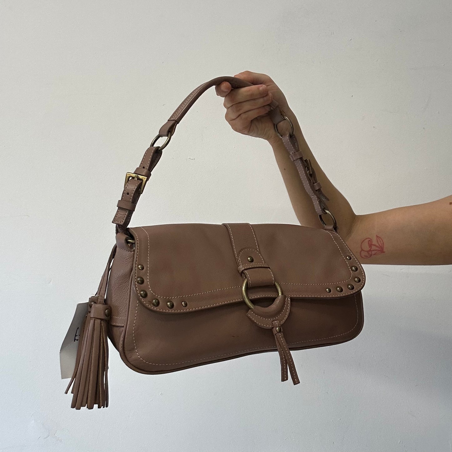 brown studded buckle shoulder bag
