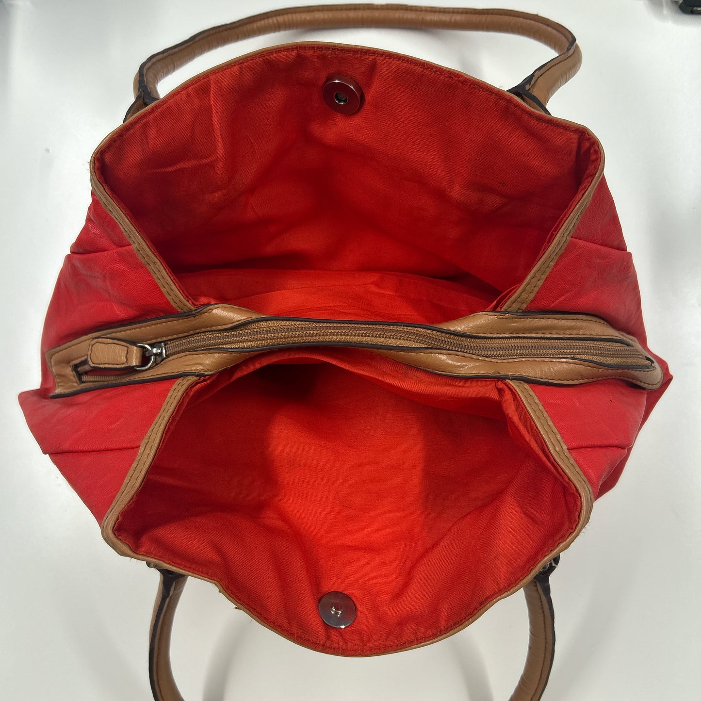red and tanned faux leather shoulder bag