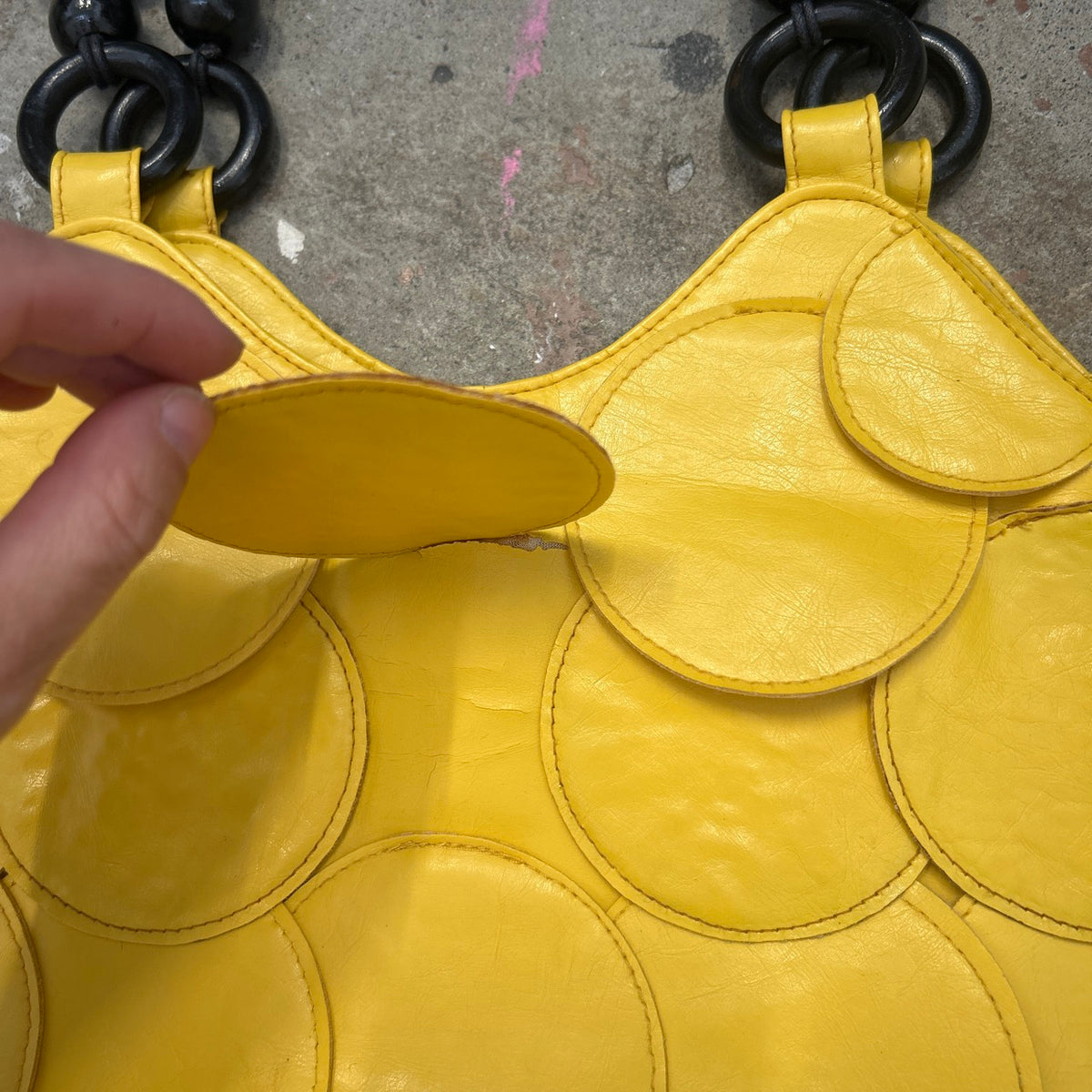 yellow faux leather disc beaded shoulder bag