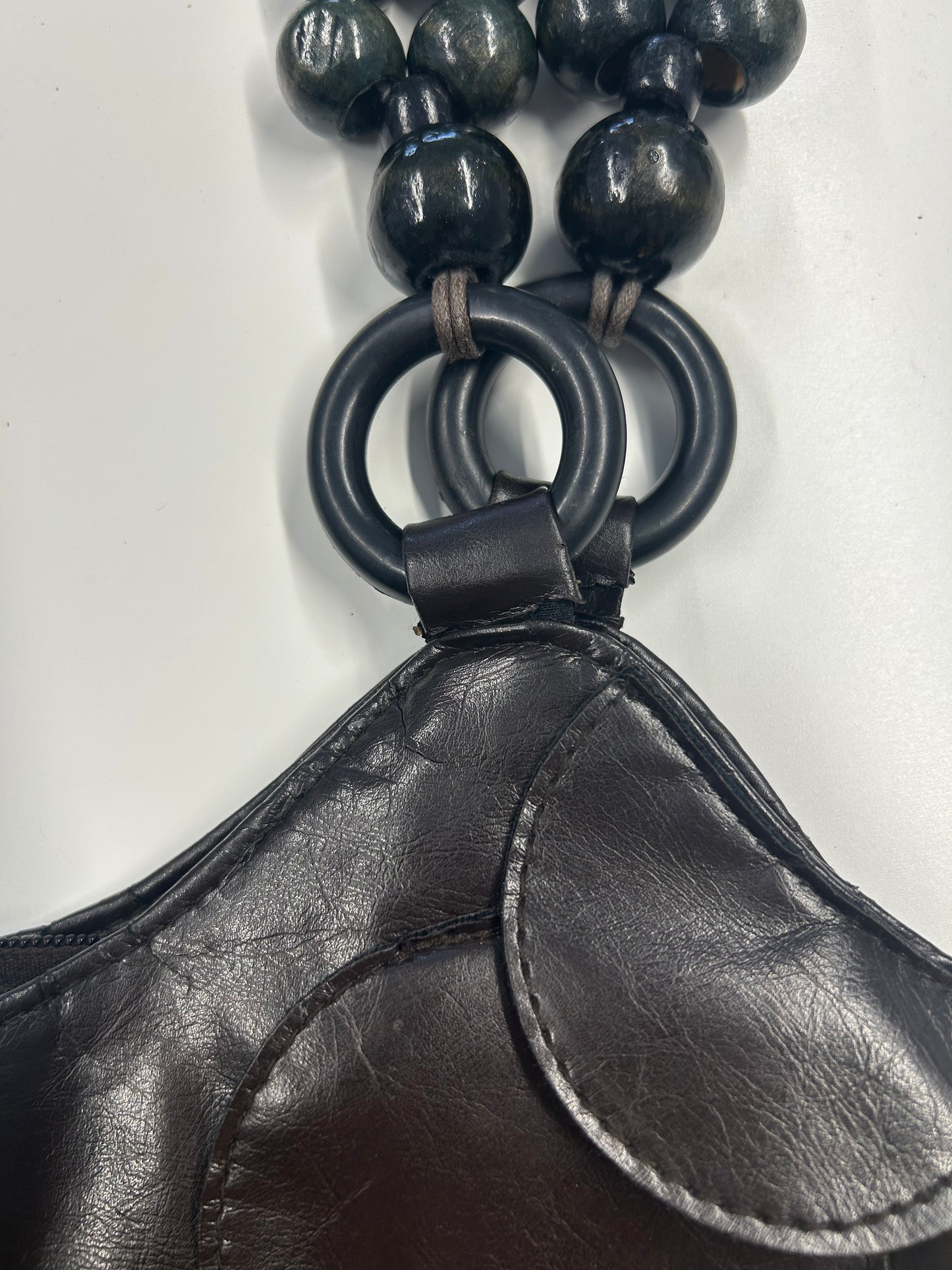 dark brown faux leather disc beaded shoulder bag