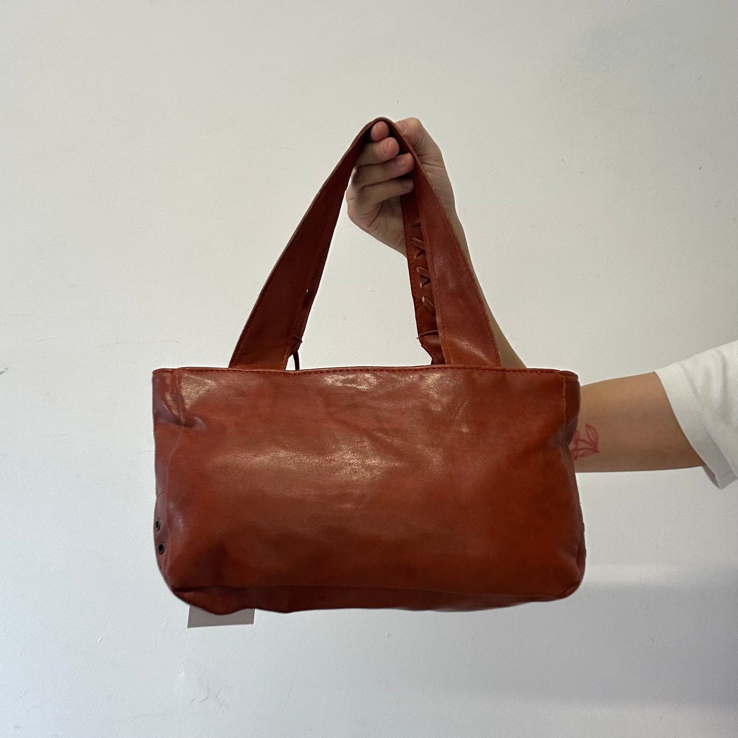 burnt orange / brown leather buckle shoulder bag