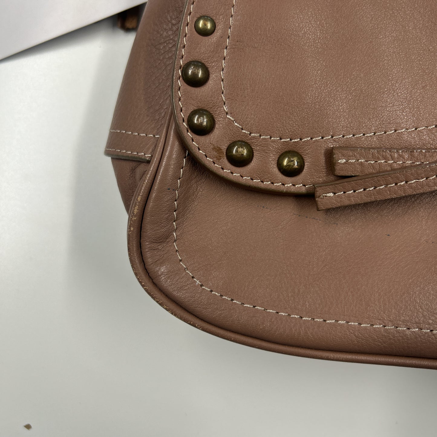 tanned brown studded buckle faux leather shoulder bag