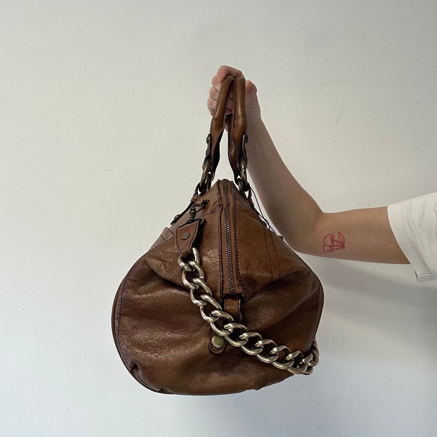 brown faux leather chain detailing hand bag