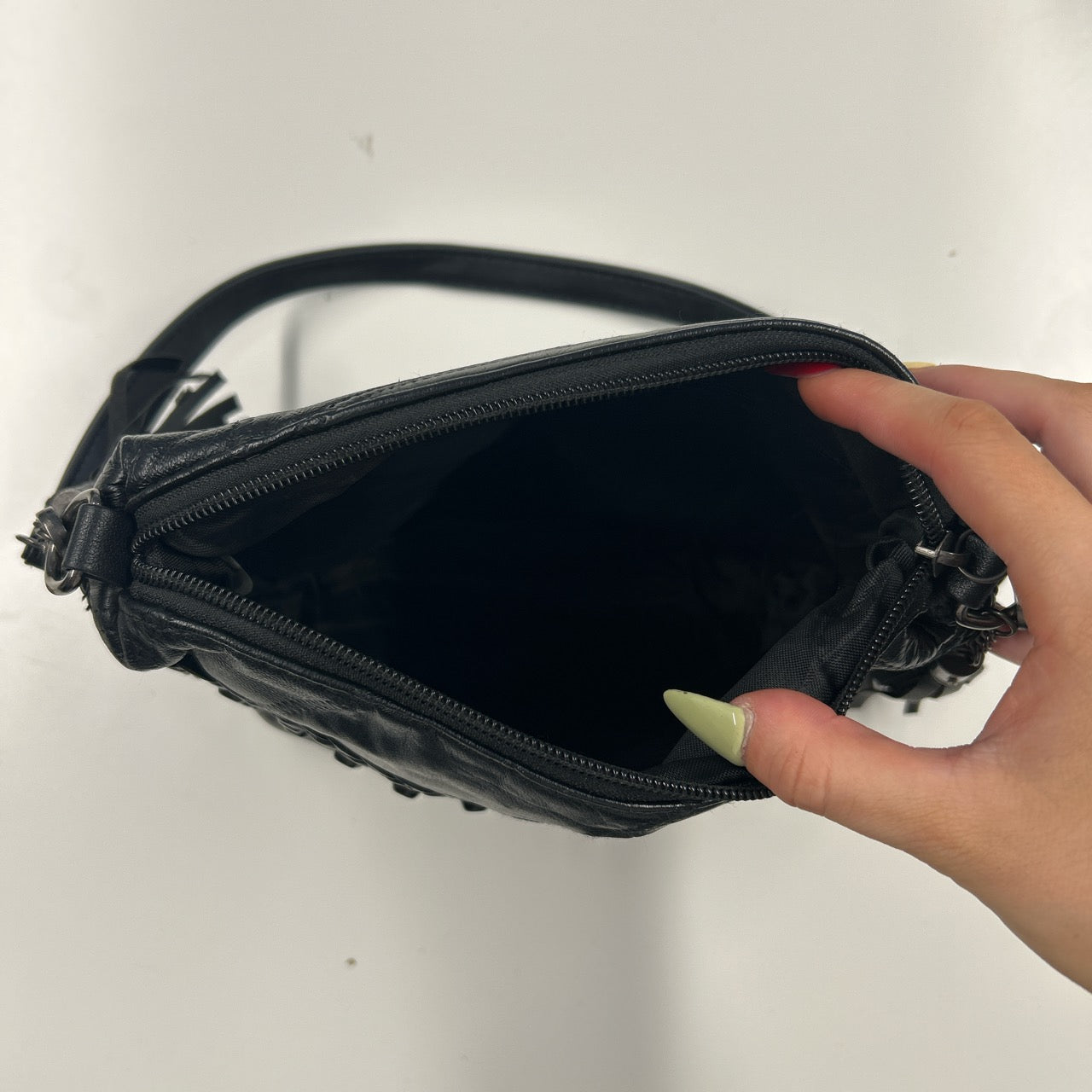 black faux leather studded shoulder bag