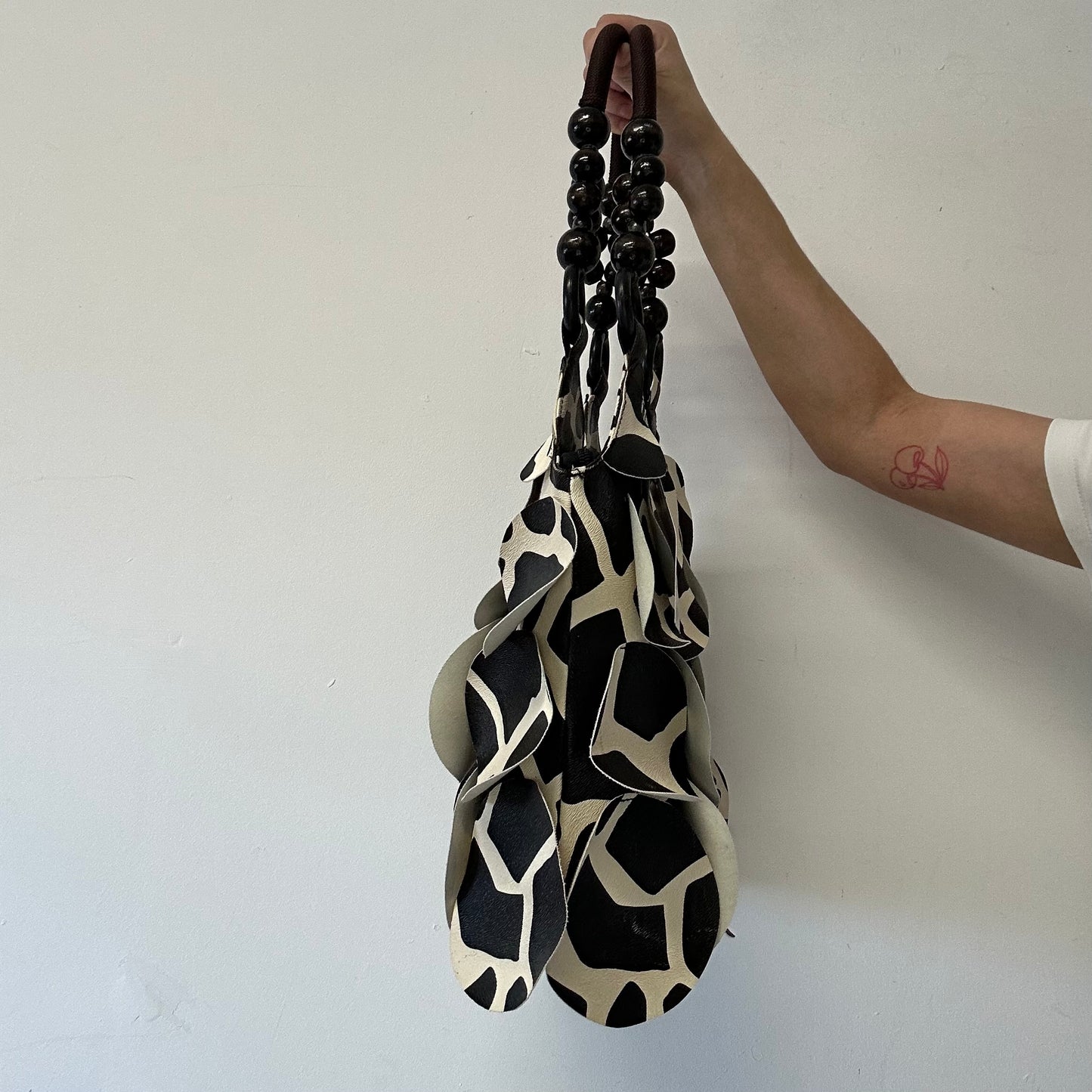 giraffe print faux leather disc beaded shoulder bag