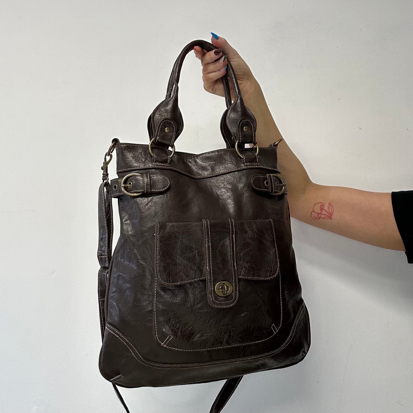 brown leather buckle shoulder bag