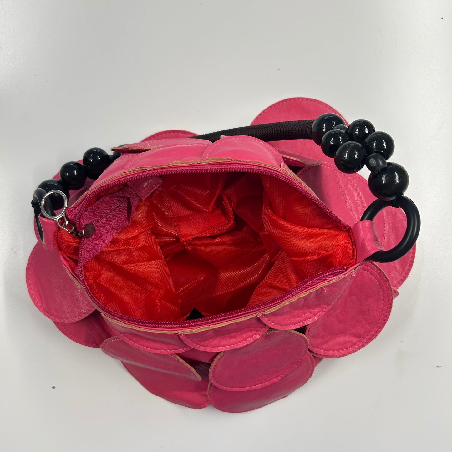 pink faux leather disc beaded shoulder bag